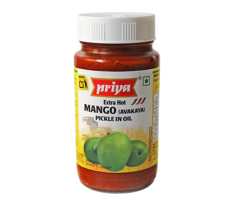 A bottle of Priya Extra Hot Mango (Avakaya) Pickle in Oil, featuring a white cap and a label with green mango illustrations, set against a plain white background.