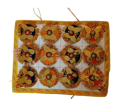 Decorative wall hanging with floral designs on a white background
